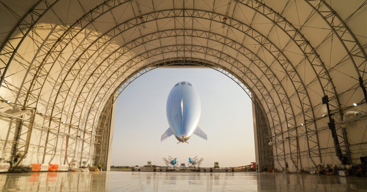 Sceye ST1 launching from a vast hangar canopy